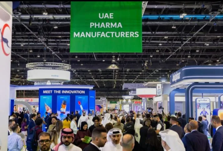 Crowds in the DUPHAT 2026 exhibition hall in Dubai, beneath the "UAE Pharma Manufacturers" sign
